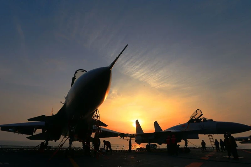 This photo taken on April 24, 2018 shows J15 fighter jets on China's sole operational aircraft carrier, the Liaoning, during a drill at sea. - A flotilla of Chinese naval vessels held a "live combat drill" in the East China Sea, state media reported early April 23, 2018, the latest show of force by Beijing's burgeoning navy in disputed waters that have riled neighbours. (Photo by - / AFP) / China OUT        (Photo credit should read -/AFP via Getty Images)