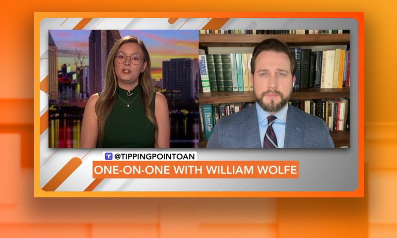 Video still from William Wolfe's interview with Tipping Point on One America News Network