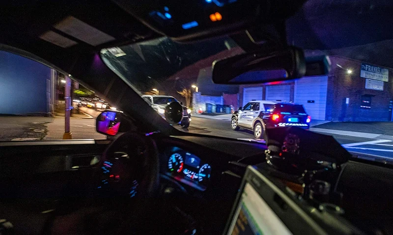 A police cruiser takes part in a pursuit with other cruisers as they attempt to catch a man who stole a car and sped away in Chelsea, Massachusetts on May 1, 2021. - Chelsea, a 2.2 square-mile (5.7 square km) city, has a population of close to 40,000 people made up of mostly people of Latino or Hispanic origin, 67% according to the US Census Bureau. The Bureau also reports that 18% of the population lives at the poverty line. The Chelsea Police Department considers itself ahead of many parts of theUS when it comes to community policing and the way it deals with de-escalating domestic and criminal situations. (Photo by Joseph Prezioso / AFP) (Photo by JOSEPH PREZIOSO/AFP via Getty Images)