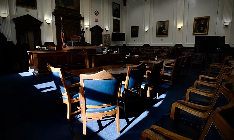 KENOSHA, WISCONSIN - NOVEMBER 19: The sun shines through a window of the empty courtroom onto the chair Kyle Rittenhouse has used throughout the trial as the jury deliberates in private at the Kenosha County Courthouse on November 19, 2021 in Kenosha, Wisconsin. Rittenhouse is accused of shooting three demonstrators, killing two of them, during a night of unrest that erupted in Kenosha after a police officer shot Jacob Blake seven times in the back while being arrested in August 2020. Rittenhouse, from Antioch, Illinois, was 17 at the time of the shooting and armed with an assault rifle. He faces counts of felony homicide and felony attempted homicide. (Photo by Sean Krajacic - Pool/Getty Images)