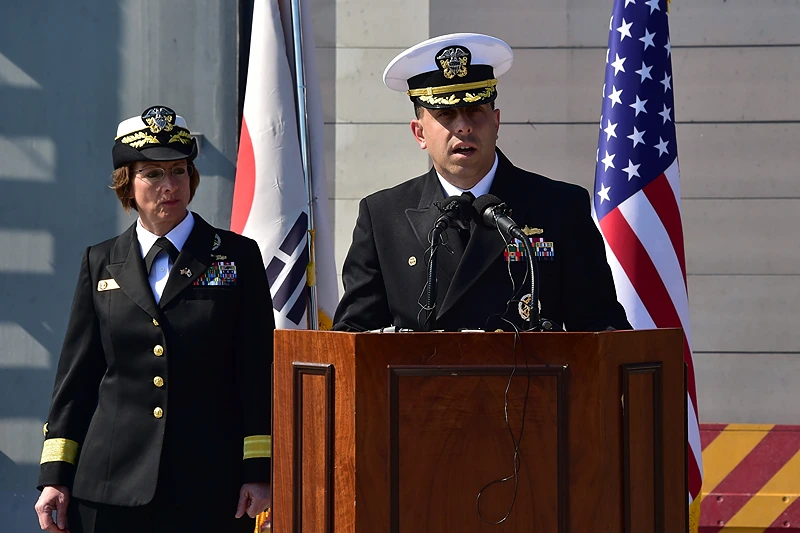US Rear Admiral Matt Kawas (R), commander of the USS Fort Worth (LCS 3), speaks as US Rear Admiral Lisa Franchetti (L), commander of US Naval Forces Korea, looks on during a media tour on board at a South Korean naval port in the southeastern port city of Busan on March 14, 2015. USS Fort Worth is the first US Navy Littoral Combat Ship to visit Korea and is participating in the annual Foal Eagle exercise with the Republic of Korea navy. AFP PHOTO / POOL / JUNG YEON-JE (Photo credit should read JUNG YEON-JE/AFP via Getty Images)
