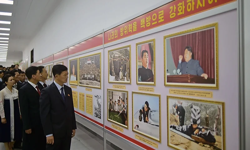 In this photo taken in Pyongyang on July 19, 2023, people visit the National Photo Exhibition, which was opened at the People's Palace of Culture to celebrate the 70th anniversary of the end of the Korean War, which the country celebrates as the day of "Victory in the Fatherland Liberation War. (Photo by KIM Won Jin / AFP) (Photo by KIM WON JIN/AFP via Getty Images)