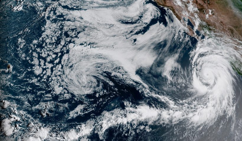 This Friday, Aug. 18, 2023, 1:10 p.m. EDT satellite image provided by the National Oceanic and Atmospheric Administration shows Hurricane Hilary, right, off Mexico’s Pacific coast. It grew rapidly to Category 4 strength and could reach Southern California as the first tropical storm there in 84 years, causing “significant and rare impacts” including extensive flooding. The U.S. National Hurricane Center said a tropical storm watch has been issued for Southern California, the first time it has ever done that. (NOAA via AP)