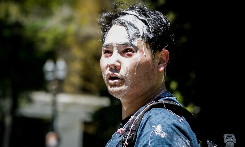 Antifa Counter-Protests As Right-Wing Groups Demonstrate In Portland PORTLAND, OR - JUNE 29: Andy Ngo, a Portland-based journalist, is seen covered in unknown substance after unidentified Rose City Antifa members attacked him on June 29, 2019 in Portland, Oregon. Several groups from the left and right clashed after competing demonstrations at Pioneer Square, Chapman Square, and Waterfront Park spilled into the streets. According to police, medics treated eight people and three people were arrested during the demonstrations. (Photo by Moriah Ratner/Getty Images)