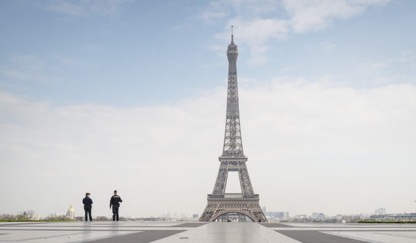 France Faces The Coronavirus PARIS, FRANCE - MARCH 17: Police officers patrol near the Eiffel Tower during a government enforced quarantine on March 17, 2020 in Paris, France. On March 17, 2020 France imposed a nationwide lockdown to control the spread of COVID-19. (Photo by Veronique de Viguerie/Getty Images)