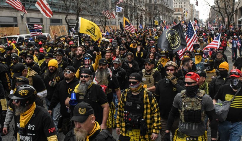 WASHINGTON, DC - DECEMBER 12: Members of the Proud Boys march towards Freedom Plaza during a protest on December 12, 2020 in Washington, DC. Thousands of protesters who refuse to accept that President-elect Joe Biden won the election are rallying ahead of the electoral college vote to make Trump's 306-to-232 loss official. (Photo by Stephanie Keith/Getty Images)