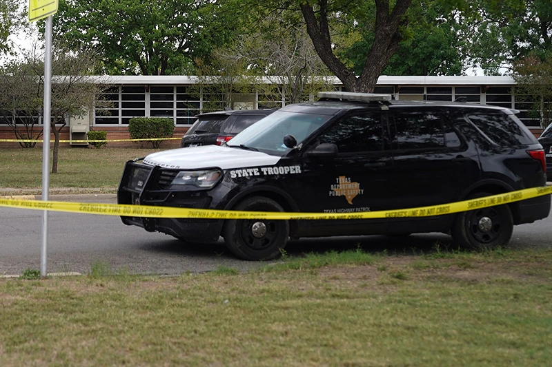 TOPSHOT-US-SCHOOL-CRIME-TEXAS
TOPSHOT - Sheriff crime scene tape is seen outside of Robb Elementary School as State troopers guard the area in Uvalde, Texas, on May 24, 2022. - An 18-year-old gunman killed 14 children and a teacher at an elementary school in Texas on Tuesday, according to the state's governor, in the nation's deadliest school shooting in years. (Photo by allison dinner / AFP) (Photo by ALLISON DINNER/AFP via Getty Images)