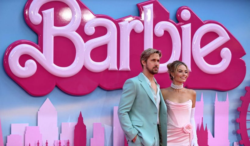 Canadian actor Ryan Gosling and Australian actress Margot Robbie (R) pose on the pink carpet upon arrival for the European premiere of "Barbie" in central London on July 12, 2023. (Photo by JUSTIN TALLIS / AFP) (Photo by JUSTIN TALLIS/AFP via Getty Images)