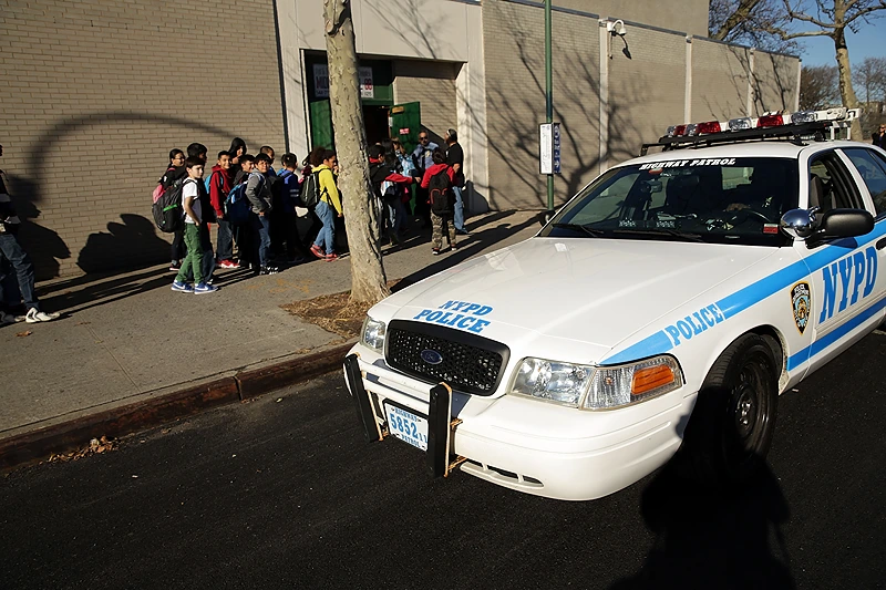 Brooklyn School Evacuated After Bomb Threat
NEW YORK, NY - DECEMBER 15: A police car is viewed in front of the Peter Rouget Brooklyn middle school as children are let back in following reports of a bomb threat on December 15, 2015 in New York City. New York City received the same bomb threat that shut down more than 900 Los Angeles schools on Tuesday. New York Police Commissioner Bill Bratton said the NYPD deemed the threat a "hoax" and has kept schools open. (Photo by Spencer Platt/Getty Images)