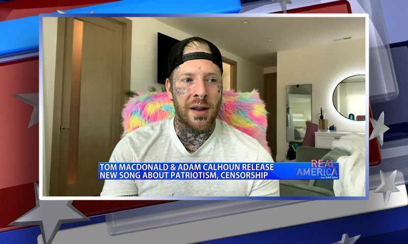 Video still from Tom MacDonald and Adam Calhoun's interview with Real America on One America News Network