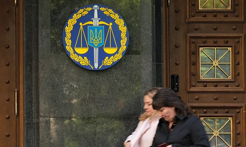 KIEV, UKRAINE - OCTOBER 02: People leave the offices of the Ukrainian General Prosecutor on October 02, 2019 in Kiev, Ukraine. Ukraine has found itself at the core of a political storm in U.S. politics since the release of a whistleblower's complaint suggesting U.S. President Donald Trump, at the expense of U.S. foreign policy, pressured Ukraine to investigate Trump's rival, Joe Biden, and Biden's son, Hunter. Trump and his allies have suggested Biden, during Biden's term as Vice President, forced Ukraine to fire then General Prosecutor Viktor Shokin in order to shield Hunter, who was on the board of a Ukrainian company. Anti-corruption workers in Ukraine counter that the Obama administration, as well as other western governments, demanded Ukraine fire Shokin because Shokin was in fact impeding anti-corruption efforts. (Photo by Sean Gallup/Getty Images)