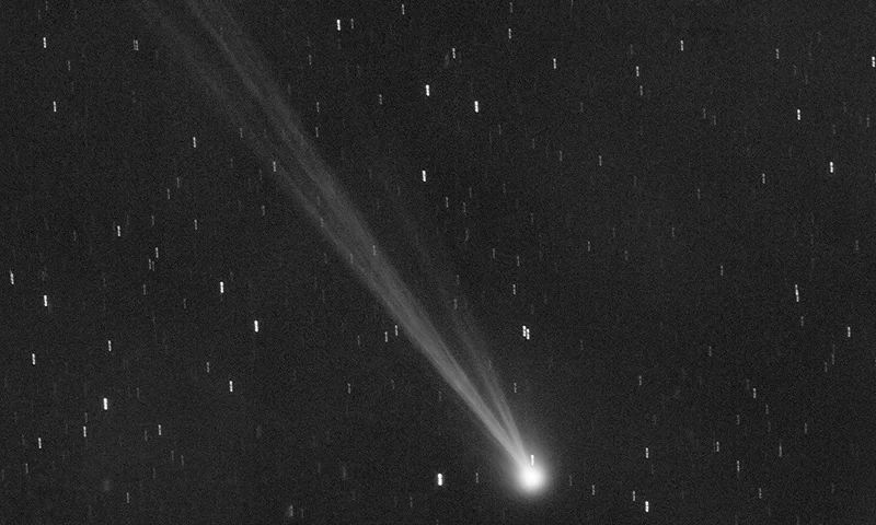 This image provided by Gianluca Masi shows the comet C/2023 P1 Nishimura and its tail seen from Manciano, Italy on Sept. 5, 2023. Stargazers across the Northern Hemisphere should catch a glimpse as soon as possible because it will be another 400 years before the wandering ice ball returns. (Gianluca Masi via AP)