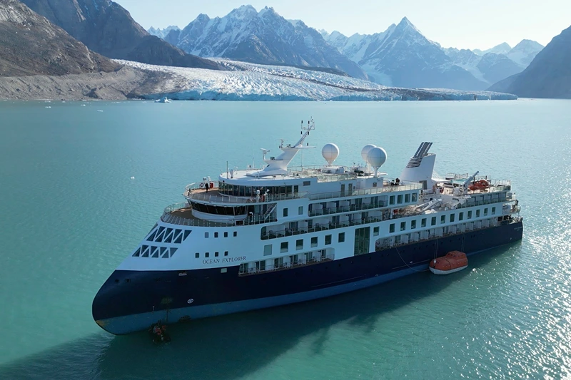 A view of the Ocean Explorer, a Bahamas-flagged Norwegian cruise ship with 206 passengers and crew, which has run aground in northwestern Greenland is pictured on Tuesday, Sept. 12, 2023. The 104.4-meter (343-foot) long and 18-meter (60 foot) wide Ocean Explorer ran aground on Monday in Alpefjord in the Northeast Greenland National Park. Another attempt to pull free a luxury cruise ship with 206 people that ran aground in the world’s northernmost national park has failed by using the high tide. It was the third attempt to free the MV Ocean Explorer. (SIRIUS/Joint Arctic Command via AP)