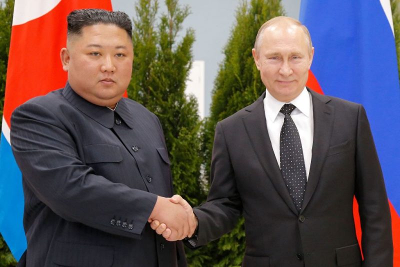 TOPSHOT - Russian President Vladimir Putin and North Korean leader Kim Jong Un shake hands as they pose for pictures prior to their talks at the Far Eastern Federal University campus on Russky island in the far-eastern Russian port of Vladivostok on April 25, 2019. (Photo by Alexander Zemlianichenko / POOL / AFP) (Photo by ALEXANDER ZEMLIANICHENKO/POOL/AFP via Getty Images)