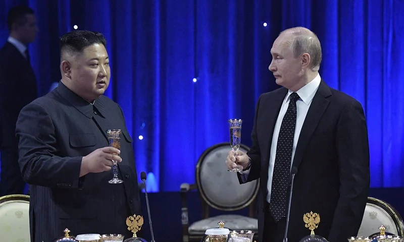 RUSSIA-NKOREA-DIPLOMACY Russian President Vladimir Putin and North Korean leader Kim Jong Un attend a reception following their talks at the Far Eastern Federal University campus on Russky island in the far-eastern Russian port of Vladivostok on April 25, 2019. (Photo by Alexey NIKOLSKY / SPUTNIK / AFP) (Photo by ALEXEY NIKOLSKY/SPUTNIK/AFP via Getty Images)
