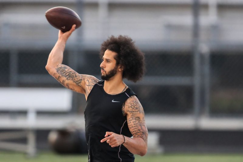 RIVERDALE, GA - NOVEMBER 16: Colin Kaepernick makes a pass during a private NFL workout held at Charles R Drew high school on November 16, 2019 in Riverdale, Georgia. Due to disagreements between Kaepernick and the NFL the location of the workout was abruptly changed. (Photo by Carmen Mandato/Getty Images)