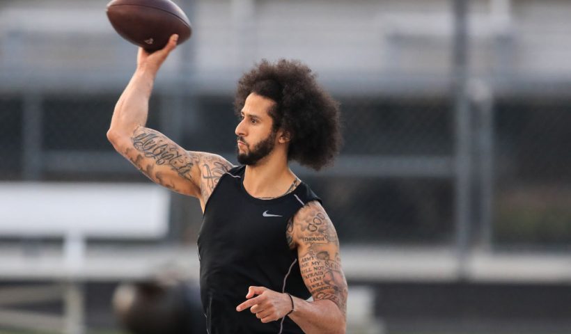 RIVERDALE, GA - NOVEMBER 16: Colin Kaepernick makes a pass during a private NFL workout held at Charles R Drew high school on November 16, 2019 in Riverdale, Georgia. Due to disagreements between Kaepernick and the NFL the location of the workout was abruptly changed. (Photo by Carmen Mandato/Getty Images)