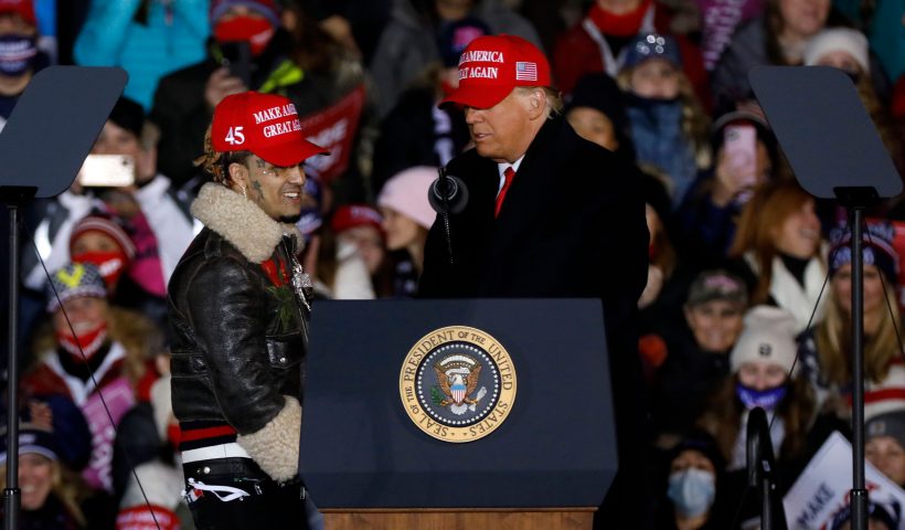 US-VOTE-TRUMP US President Donald Trump invites rapper Lil Pump on stage during his final Make America Great Again rally of the 2020 US Presidential campaign at Gerald R. Ford International Airport on November 2, 2020, in Grand Rapids, Michigan. (Photo by JEFF KOWALSKY / AFP) (Photo by JEFF KOWALSKY/AFP via Getty Images)