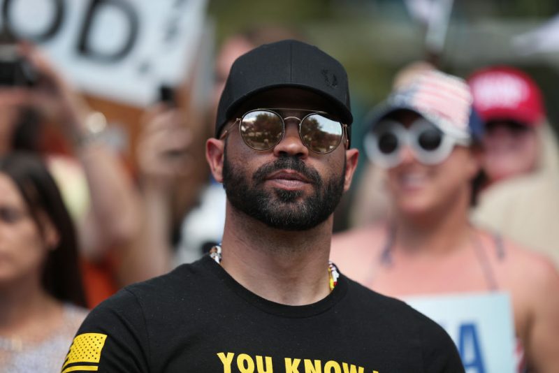 ORLANDO, FLORIDA - FEBRUARY 27: Enrique Tarrio, leader of the Proud Boys, stands outside of the Hyatt Regency where the Conservative Political Action Conference is being held on February 27, 2021 in Orlando, Florida. Begun in 1974, CPAC brings together conservative organizations, activists, and world leaders to discuss issues important to them. (Photo by Joe Raedle/Getty Images)