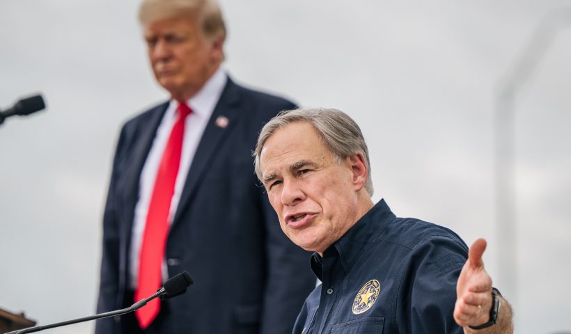 PHARR, TEXAS - JUNE 30: Texas Gov. Greg Abbott speaks alongside former President Donald Trump during a tour to an unfinished section of the border wall on June 30, 2021 in Pharr, Texas. (Photo by Brandon Bell/Getty Images)