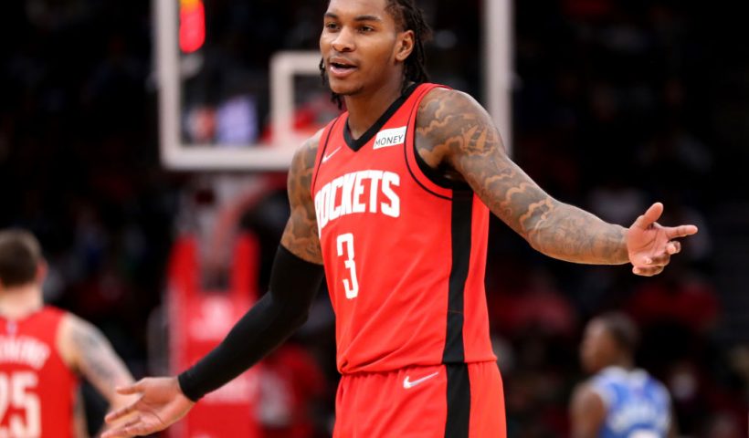 HOUSTON, TEXAS - NOVEMBER 27: Kevin Porter Jr. #3 of the Houston Rockets reacts towards the Rockets bench during the second half against the Charlotte Hornets during the first half at Toyota Center on November 27, 2021 in Houston, Texas. NOTE TO USER: User expressly acknowledges and agrees that, by downloading and or using this photograph, User is consenting to the terms and conditions of the Getty Images License Agreement. (Photo by Carmen Mandato/Getty Images)