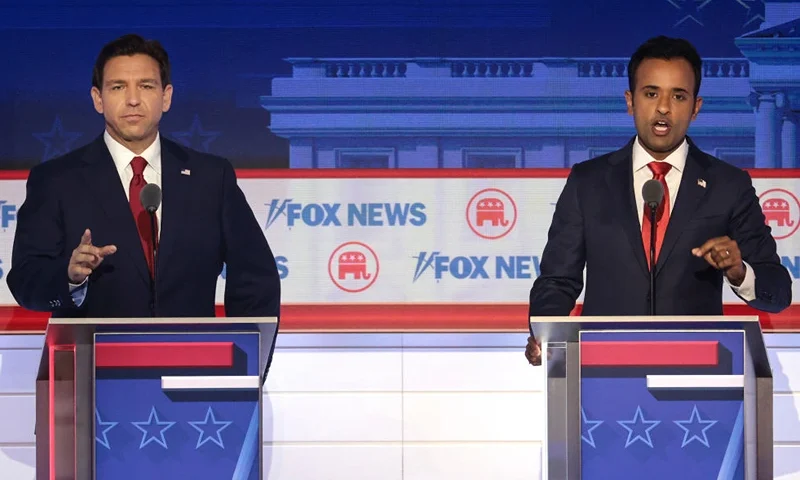 MILWAUKEE, WISCONSIN - AUGUST 23: Republican presidential candidates (L-R), Florida Gov. Ron DeSantis and Vivek Ramaswamy participate in the first debate of the GOP primary season hosted by FOX News at the Fiserv Forum on August 23, 2023 in Milwaukee, Wisconsin. Eight presidential hopefuls squared off in the first Republican debate as former U.S. President Donald Trump, currently facing indictments in four locations, declined to participate in the event. (Photo by Win McNamee/Getty Images)