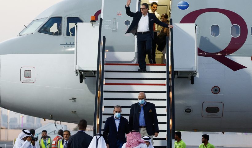 US citizens Siamak Namazi (C-back), Emad Sharqi (bottom-L) and Morad Tahbaz (bottom-R) disembark from a Qatari jet upon their arrival at the Doha International Airport in Doha on September 18, 2023. (Photo by KARIM JAAFAR/AFP via Getty Images)