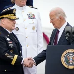 Armed Forces Farewell Tribute Held In Honor Of General Mark A. Milley ARLINGTON, VIRGINIA - SEPTEMBER 29: U.S. President Joe Biden shakes hands with outgoing Chairman of the Joint Chiefs of Staff General Mark Milley as Biden arrives for an Armed Forces Farewell Tribute in Milley's honor at Summerall Field at Joint Base Myer-Henderson Hall September 29, 2023 in Arlington, Virginia. Incoming Chairman of the Joint Chiefs of Staff General Charles Q. Brown Jr. will be the 21st person to hold the position. (Photo by Drew Angerer/Getty Images)