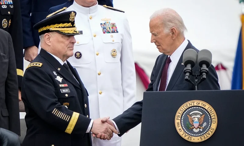 Armed Forces Farewell Tribute Held In Honor Of General Mark A. Milley ARLINGTON, VIRGINIA - SEPTEMBER 29: U.S. President Joe Biden shakes hands with outgoing Chairman of the Joint Chiefs of Staff General Mark Milley as Biden arrives for an Armed Forces Farewell Tribute in Milley's honor at Summerall Field at Joint Base Myer-Henderson Hall September 29, 2023 in Arlington, Virginia. Incoming Chairman of the Joint Chiefs of Staff General Charles Q. Brown Jr. will be the 21st person to hold the position. (Photo by Drew Angerer/Getty Images)