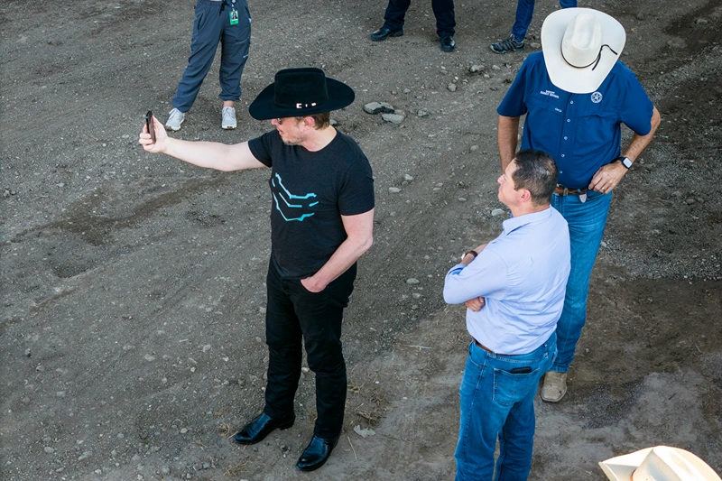 Elon Musk Visits Texas-Mexico Border
EAGLE PASS, TEXAS - SEPTEMBER 28: An aerial view of tech entrepreneur Elon Musk, wearing a black Stetson hat, livestreaming while visiting the Texas-Mexico border on September 28, 2023 in Eagle Pass, Texas. Musk toured the border along the bank of the Rio Grande with Rep. Tony Gonzales (R-Texas) to see firsthand the ongoing migrant crisis, which he has called a "serious issue." (Photo by John Moore/Getty Images)