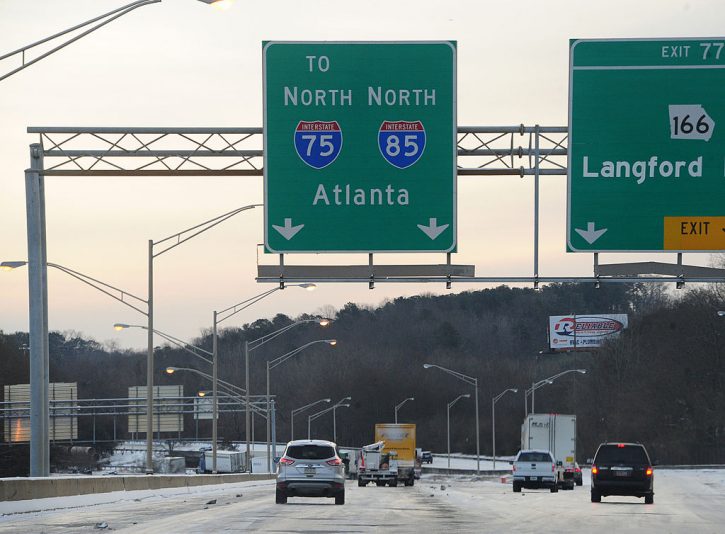 ATLANTA, GA - JANUARY 29: Cars drive along Interstate 75 in icy conditions January 29, 2014 in Atlanta, Georgia. Thousands of motorists were stranded, many overnight, as a winter storm dropped three inches of snow, and ice made driving hazardous. (Photo by Scott Cunninghaml/Getty Images)