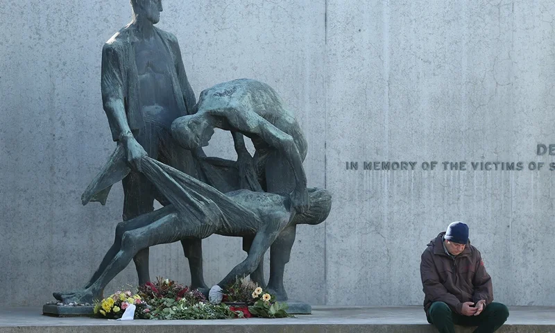 Sachsenhausen Concentration Camp Liberation 70th Anniversary Nears ORANIENBURG, GERMANY - MARCH 18: A visitor sits next to a memorial at Station Z, where inmates were executed, their gold teeth removed and their bodies burned at the former Sachsenhausen concentration camp near Berlin on March 18, 2015 in Oranienburg, Germany. The Nazis ran Sachsenhausen from 1936-1945, using it initially for political prisoners, then later also for Soviet prisoners of war, Jews, homosexuals, Jehova's Witnesses and other victims. The camp included a gas chamber, execution pit and ovens for burning bodies, and an estimated 30,000 inmates died. Germany will soon commemorate the 70th anniversary of the April 22, 1945 liberation of the camp by Soviet and Polish soldiers. (Photo by Sean Gallup/Getty Images)