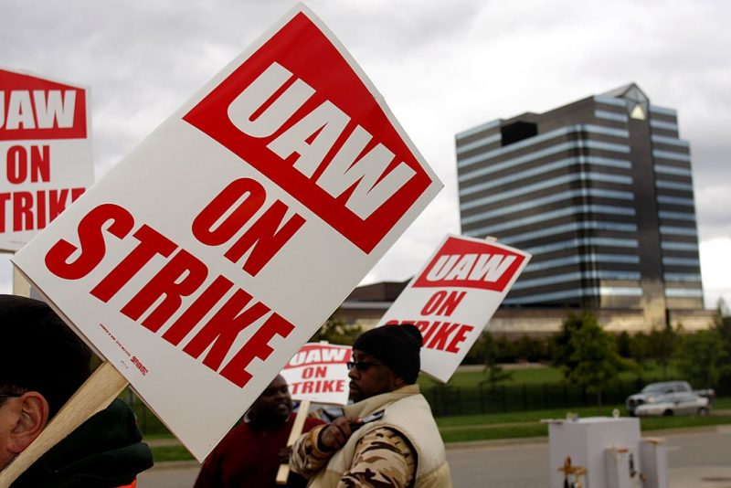 AUBURN HILLS MI - OCTOBER 10: United Auto Workers members walk off the job and picket at the Chrysler LLC world headquarters after the UAW and Chrysler LLC failed to reach a tentative contract agreement by an 11am UAW strike-imposed deadline October 10, 2007 in Auburn Hills, Michigan. (Photo by Bill Pugliano/Getty Images)