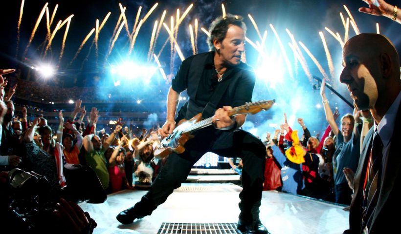 TAMPA, FL - FEBRUARY 01: Musician Bruce Springsteen and the E Street Band perform at the Bridgestone halftime show during Super Bowl XLIII between the Arizona Cardinals and the Pittsburgh Steelers on February 1, 2009 at Raymond James Stadium in Tampa, Florida. (Photo by Jamie Squire/Getty Images)