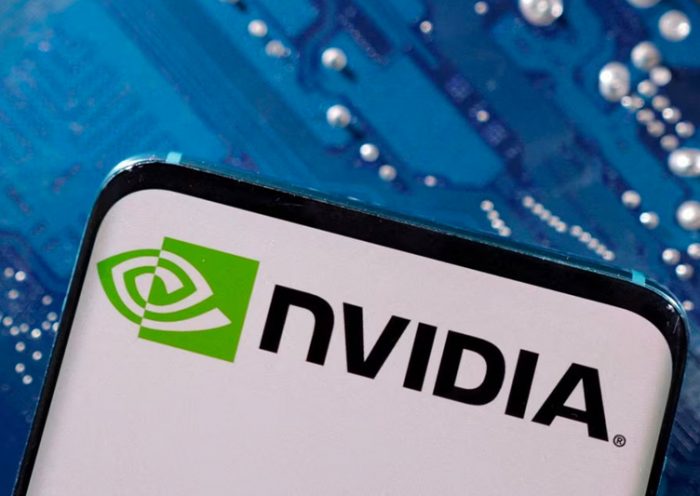 A smartphone with a displayed NVIDIA logo is placed on a computer motherboard in this illustration taken March 6, 2023. REUTERS/Dado Ruvic/Illustration/File Photo