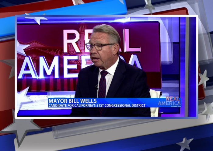 Video still from Bill Wills' interview with Real America on One America News Network
