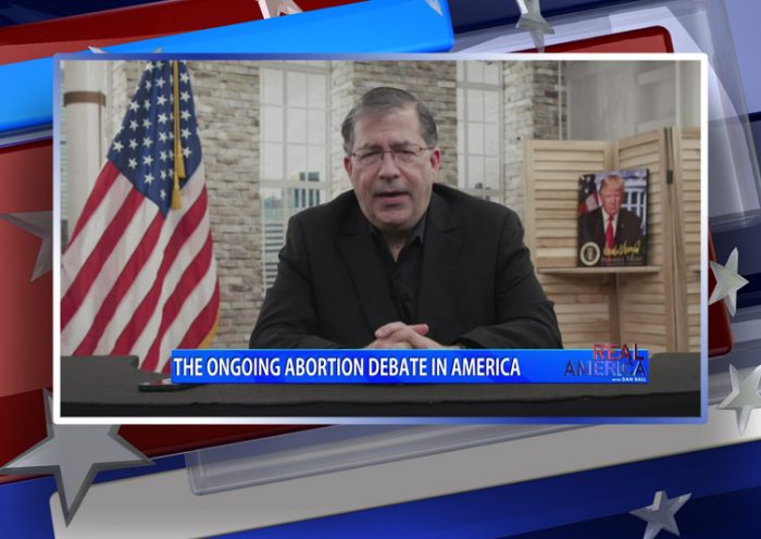 Video still from Frank Pavone's interview with Real America on One America News Network