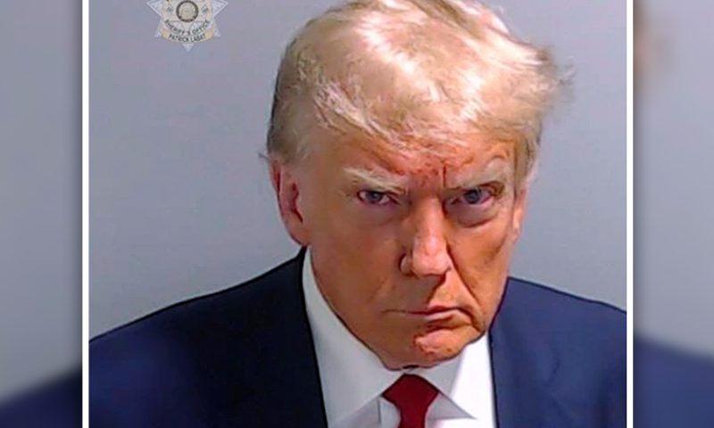 This booking photo provided by the Fulton County Sheriff’s Office shows former President Donald Trump on Thursday, Aug. 24, 2023, after he surrendered and was booked at the Fulton County Jail in Atlanta. Trump is accused by Fulton County District Attorney Fani Willis of attempting to subvert the will of Georgia voters in a bid to keep Joe Biden out of the White House. (Fulton County Sheriff’s Office via AP)