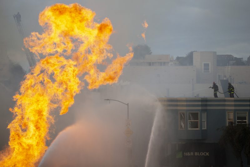 SAN FRANCISCO, CA - FEBRUARY 6: Firefighters battle a blaze following an explosion of a gas line on February 6, 2019 in San Francisco, California. Five buildings, including a medical clinic and apartment buildings were evacuated, according to published reports. (Photo by Santiago Mejia-Pool/Getty Images)