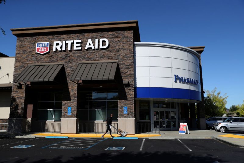 SAN RAFAEL, CALIFORNIA - SEPTEMBER 26: The Rite Aid logo is displayed on the exterior of a Rite Aid pharmacy on September 26, 2019 in San Rafael, California. Rite Aid stock surged today after the company reported better-than-expected second-quarter earnings despite revenues falling short. Rite Aid earnings per share rose 12 cents, beating analysts forecasts of 7 cents per share. (Photo by Justin Sullivan/Getty Images)