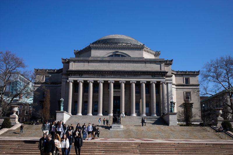 NEW YORK, NY - MARCH 09: People walk on the Columbia University campus on March 9, 2020 in New York City. The university is canceling classes for two days after a faculty member was quarantined for exposure to the novel coronavirus. The remainder of the week would be taught remotely. (Photo by Jeenah Moon/Getty Images)