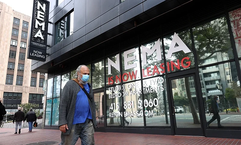 SAN FRANCISCO, CALIFORNIA - SEPTEMBER 01: A pedestrian walks by a building advertising apartment leases on September 01, 2020 in San Francisco, California. San Francisco rental prices have dropped nearly 15 percent in the past year as residents begin moving away from the city. (Photo by Justin Sullivan/Getty Images)