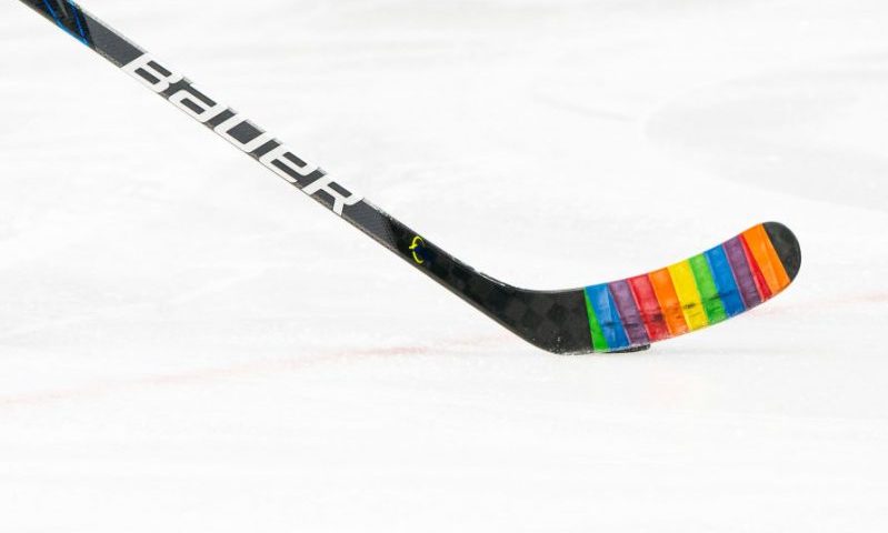 VANCOUVER, BC - MARCH 22: The Vancouver Canucks tape their sticks with rainbow tape for the pre-game warm up to celebrate "Hockey is for Everyone" prior to the start of NHL action against against the Winnipeg Jets at Rogers Arena on March 22, 2021 in Vancouver, Canada. (Photo by Rich Lam/Getty Images)