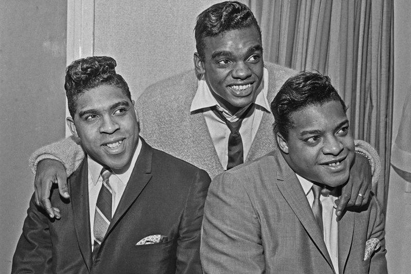 American vocal trio the Isley Brothers, UK, 24th October 1964. From left to right, they are brothers Rudolph Isley, Ronald Isley and O'Kelly Isley Jr. (Photo by Evening Standard/Hulton Archive/Getty Images)