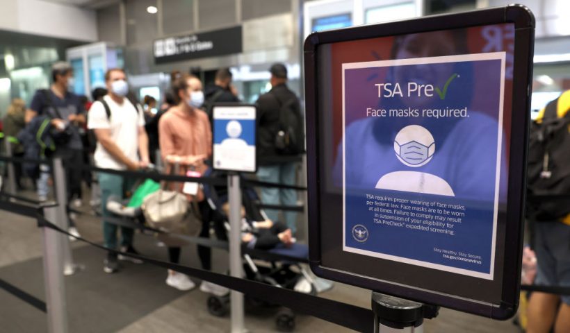 SAN FRANCISCO, CALIFORNIA - APRIL 19: A sign stating that masks are required at San Francisco International Airport stands in a terminal after the federal mask mandate for airports and pubic transportation was lifted on April 19, 2022 in San Francisco, California. The Transportation Security Administration (TSA) will not enforce a federal Covid-19 mask mandate on airplanes or public transportation after a federal judge in Florida struck down the mandate that applied to airports, airplanes and public transportation, ruling that the Centers for Disease Control and Prevention (CDC) had overstepped its authority. The CDC still recommends wearing masks on public transit. (Photo by Justin Sullivan/Getty Images)