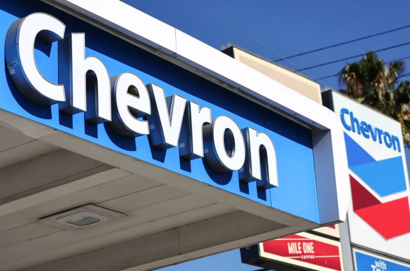 LOS ANGELES, CALIFORNIA - OCTOBER 28: The Chevron logo is displayed at a Chevron gas station on October 28, 2022 in Los Angeles, California. Chevron posted near record profits as their quarterly profit rose 84 percent to $11.23 billion amid a surge in oil prices during the quarter. (Photo by Mario Tama/Getty Images)