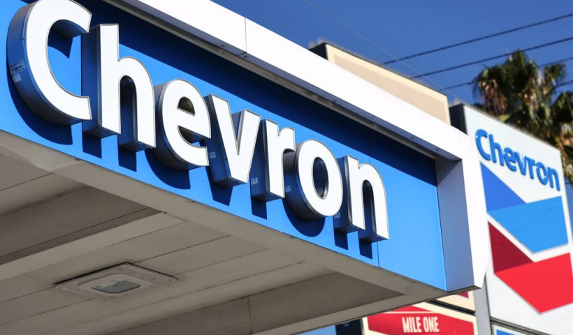 LOS ANGELES, CALIFORNIA - OCTOBER 28: The Chevron logo is displayed at a Chevron gas station on October 28, 2022 in Los Angeles, California. Chevron posted near record profits as their quarterly profit rose 84 percent to $11.23 billion amid a surge in oil prices during the quarter. (Photo by Mario Tama/Getty Images)