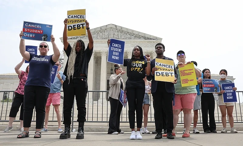 WASHINGTON, DC - JUNE 30: Student debt relief activists participate in a rally at the U.S. Supreme Court on June 30, 2023 in Washington, DC. In a 6-3 decision the Supreme Court stuck down the Biden administration’s student debt forgiveness program in Biden v. Nebraska. (Photo by Kevin Dietsch/Getty Images)
