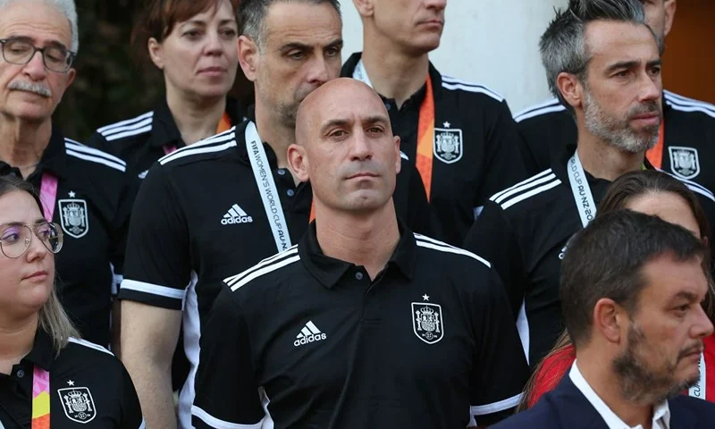 Spanish Royal Football Federation (RFEF) president Luis Rubiales (C) and Spain's coach Jorge Vilda (R) look on as Spain's acting Prime Minister receives Spain women's national football team's players after their 2023 World Cup victory at La Moncloa Palace in Madrid on August 22, 2023. Spain won the Australia and New Zealand 2023 Women's World Cup final football match after defeating England at Stadium Australia in Sydney on August 20, 2023. (Photo by Pierre-Philippe MARCOU / AFP) (Photo by PIERRE-PHILIPPE MARCOU/AFP via Getty Images)