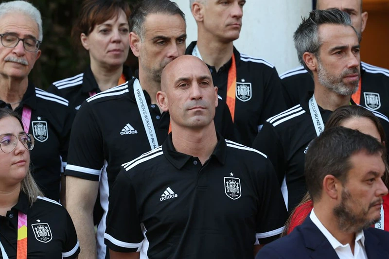 Spanish Royal Football Federation (RFEF) president Luis Rubiales (C) and Spain's coach Jorge Vilda (R) look on as Spain's acting Prime Minister receives Spain women's national football team's players after their 2023 World Cup victory at La Moncloa Palace in Madrid on August 22, 2023. Spain won the Australia and New Zealand 2023 Women's World Cup final football match after defeating England at Stadium Australia in Sydney on August 20, 2023. (Photo by Pierre-Philippe MARCOU / AFP) (Photo by PIERRE-PHILIPPE MARCOU/AFP via Getty Images)